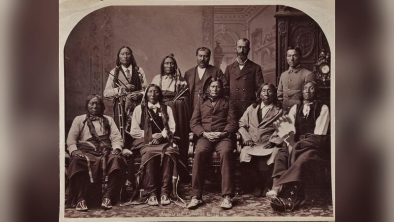 A group of Cheyenne leaders and U.S. officials photographed together in the late 19th century